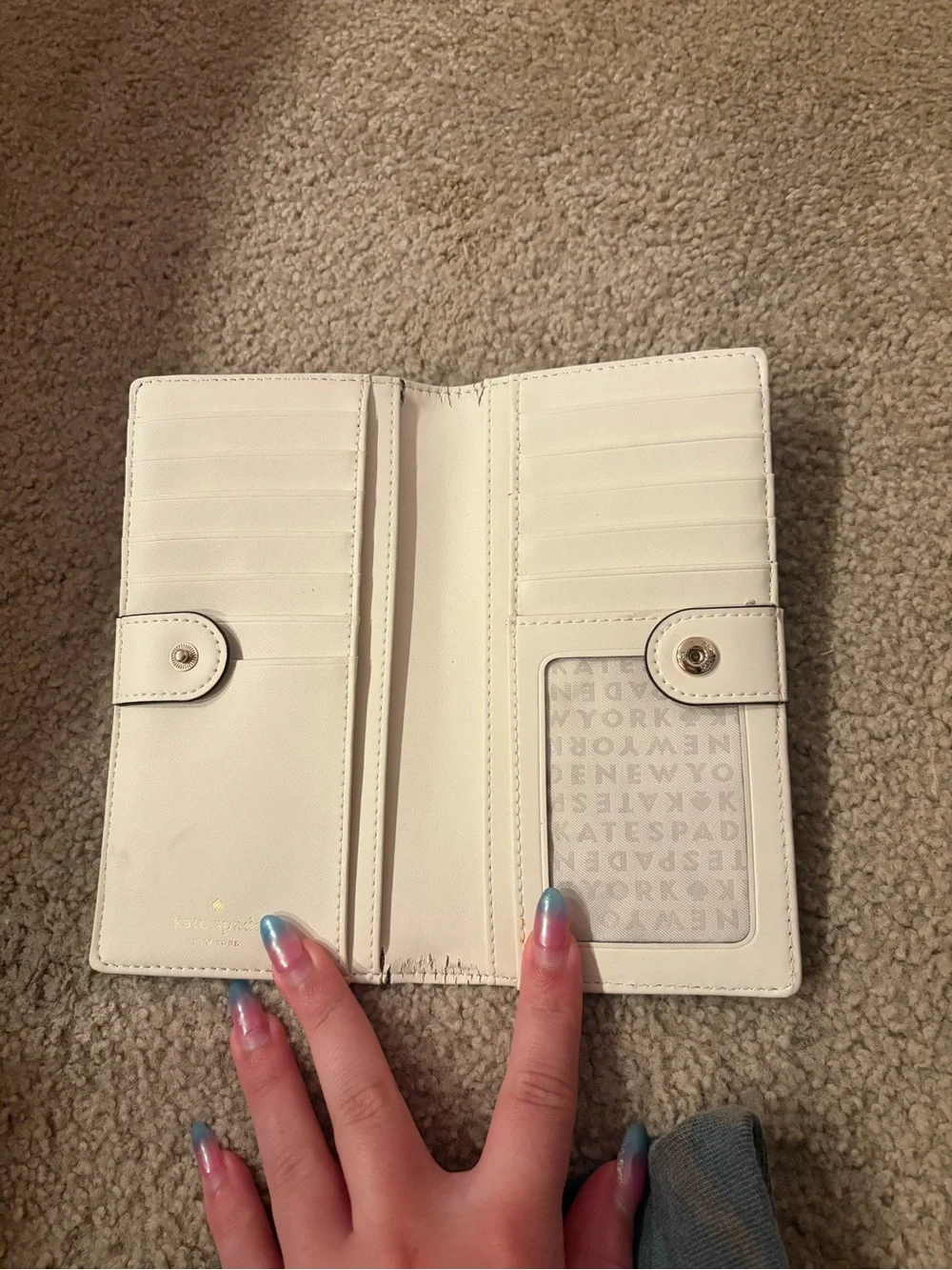 kate spade gray card holder with gold logo